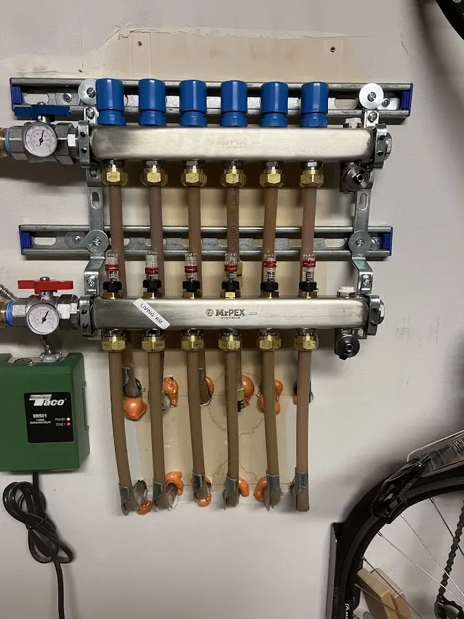 Plumber performing Leak Detection at a residential property in Kane